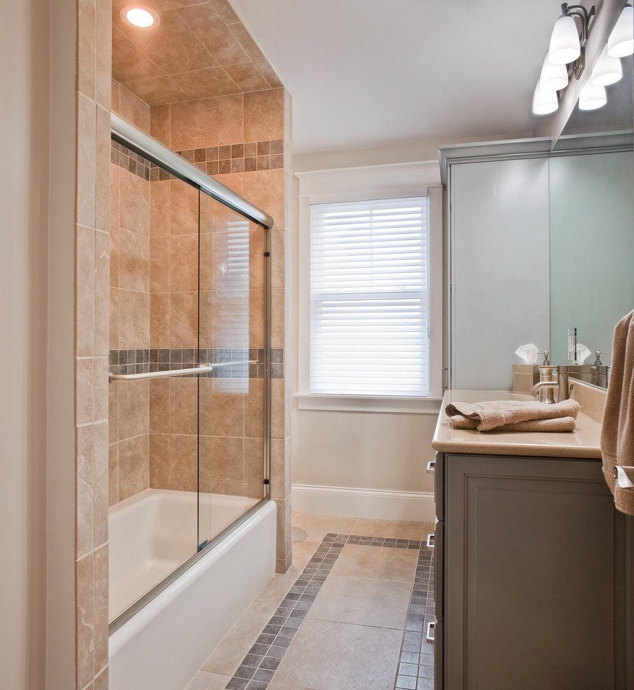 Inspiration for a mid-sized transitional 3/4 bathroom in Other with beige cabinets, an alcove tub, a shower/bathtub combo, a two-piece toilet, beige tile, ceramic tile, beige walls, ceramic floors, an undermount sink, engineered quartz benchtops, beige floor and a sliding shower screen.
