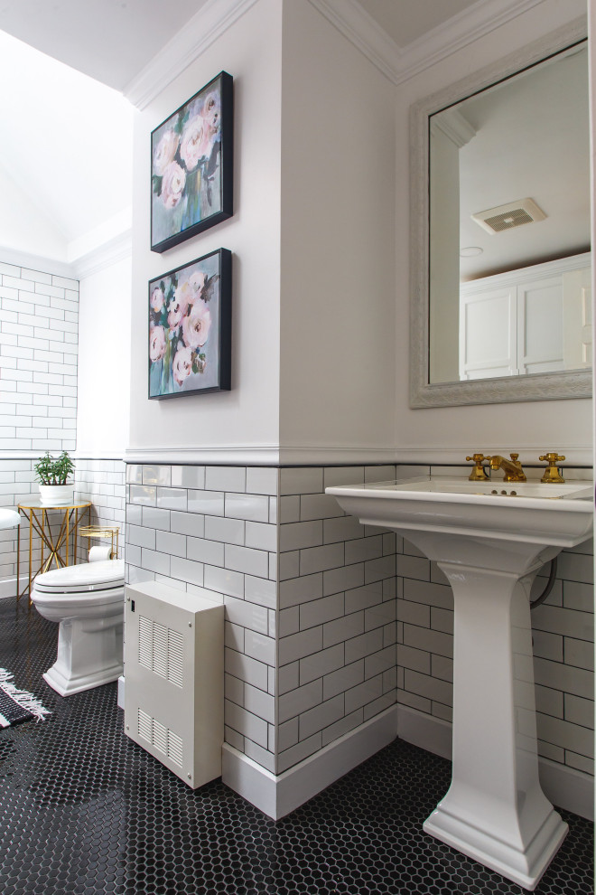 Mid-sized transitional bathroom in Boston with a claw-foot tub, a two-piece toilet, white tile, subway tile, white walls, a pedestal sink, a single vanity and a freestanding vanity.