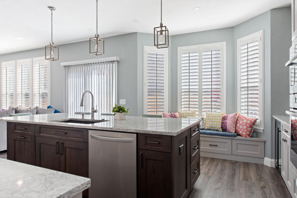 Example of a transitional kitchen design in Denver