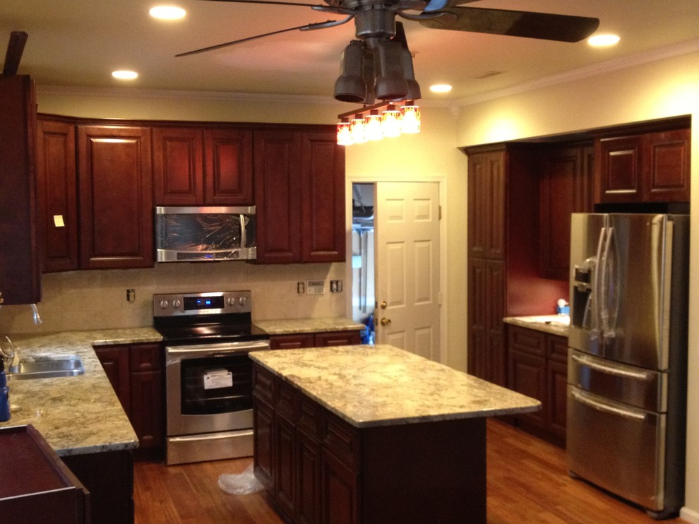 Example of a transitional brown floor kitchen design in DC Metro