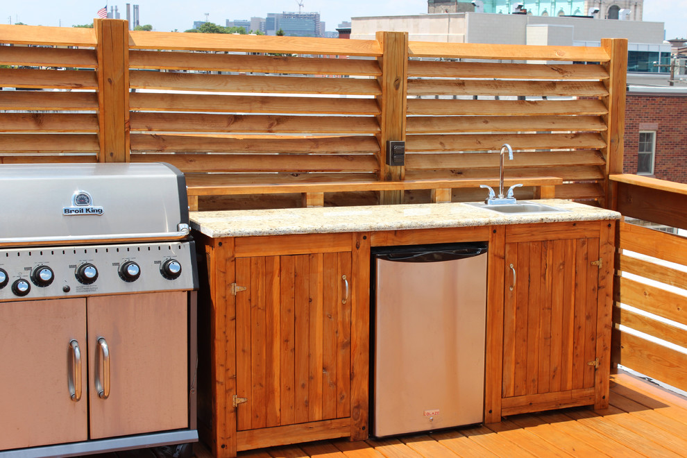 Inspiration for a mid-sized transitional rooftop deck in Philadelphia with an outdoor kitchen and no cover.