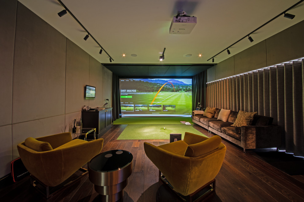 Foto de sala de juegos en casa cerrada contemporánea grande con televisor colgado en la pared