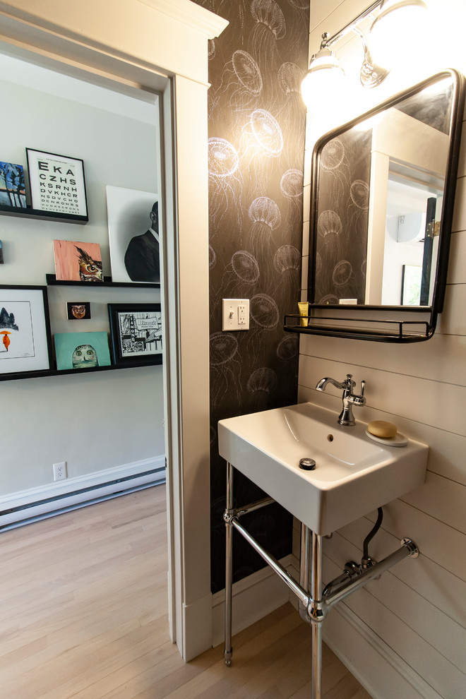 This is an example of a small transitional 3/4 bathroom in Other with open cabinets, white cabinets, a one-piece toilet, white tile, purple walls, light hardwood floors, a pedestal sink and white floor.