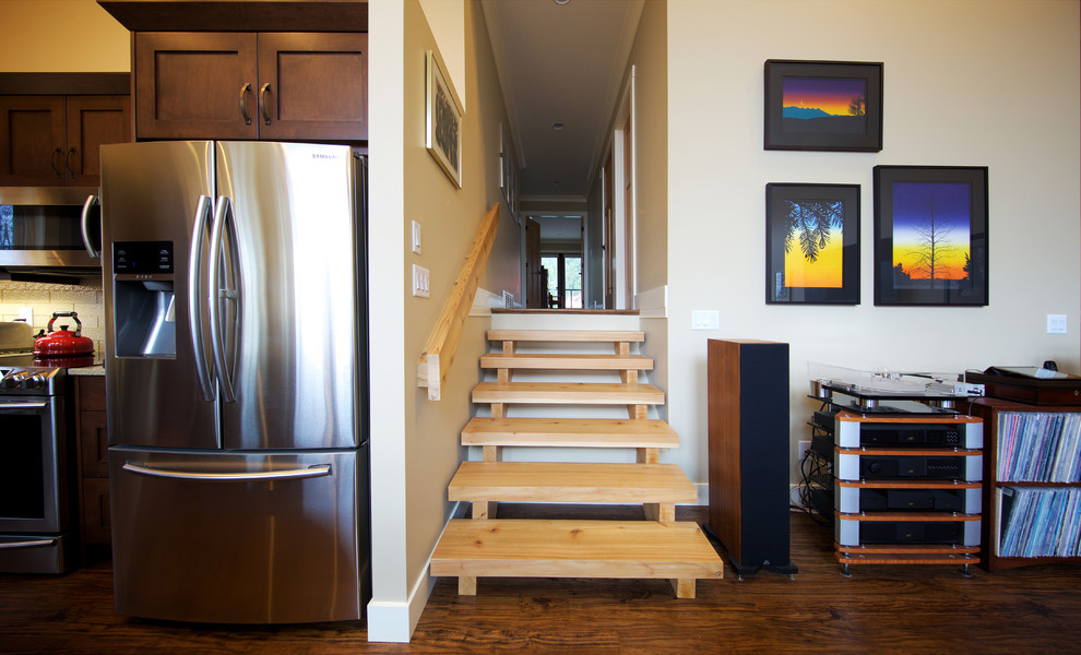 This is an example of a traditional wood straight staircase in Vancouver with open risers.