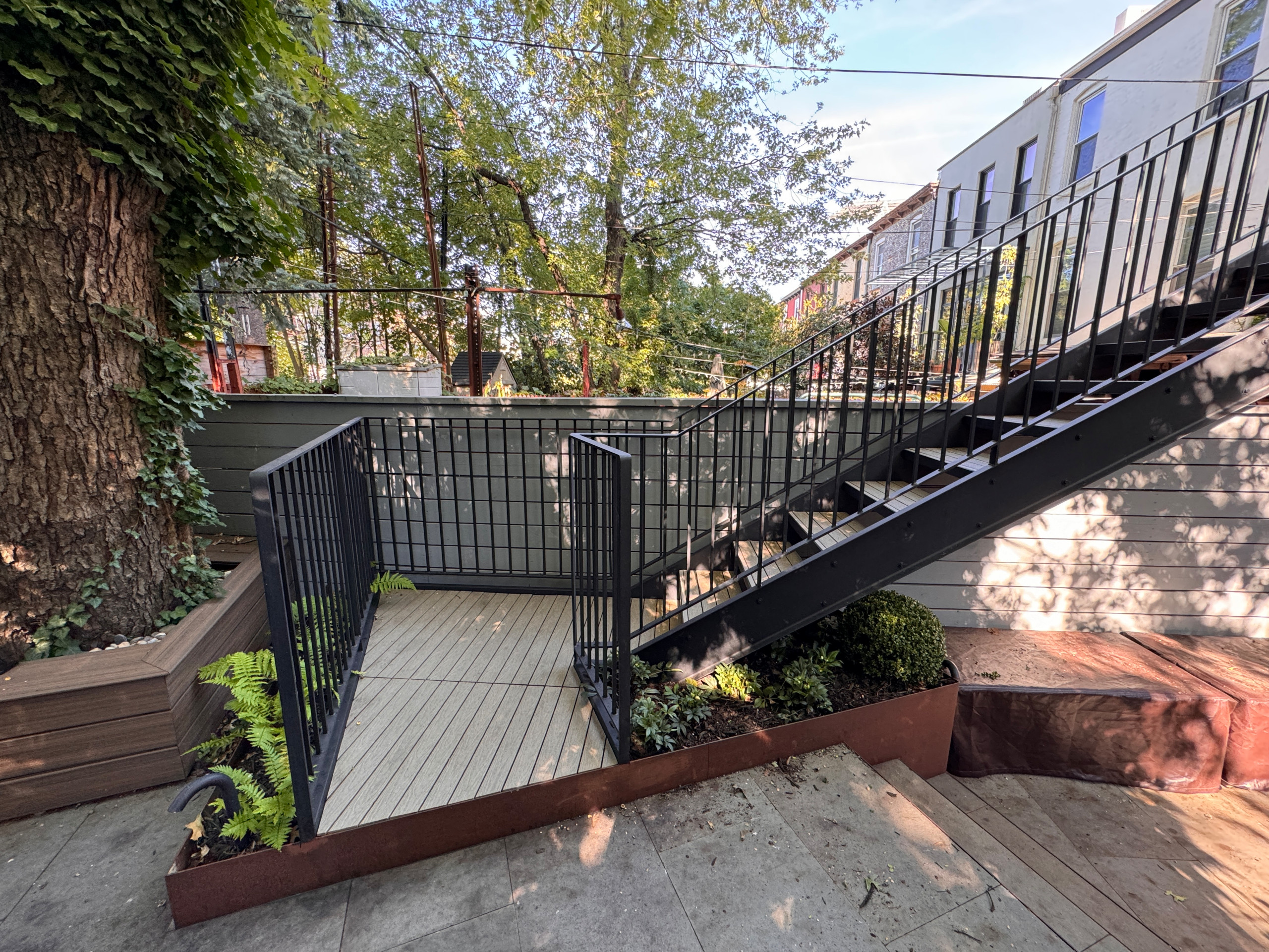 Park Slope backyard corten planters