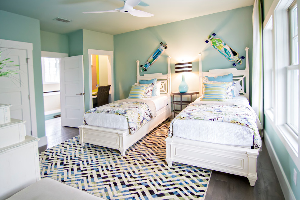 Design ideas for a large tropical gender-neutral kids' room in Jacksonville with blue walls, dark hardwood floors and brown floor.