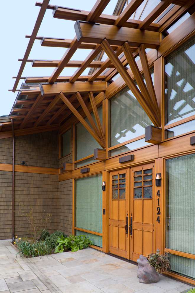 Photo of an asian front door in Seattle with a double front door.