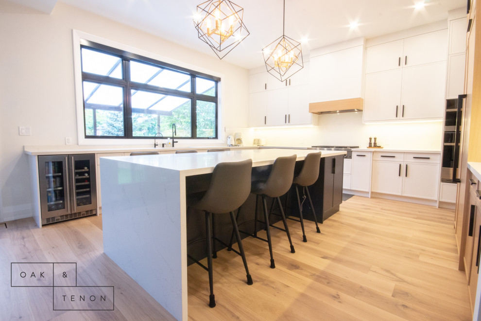 Example of a transitional kitchen design in Toronto