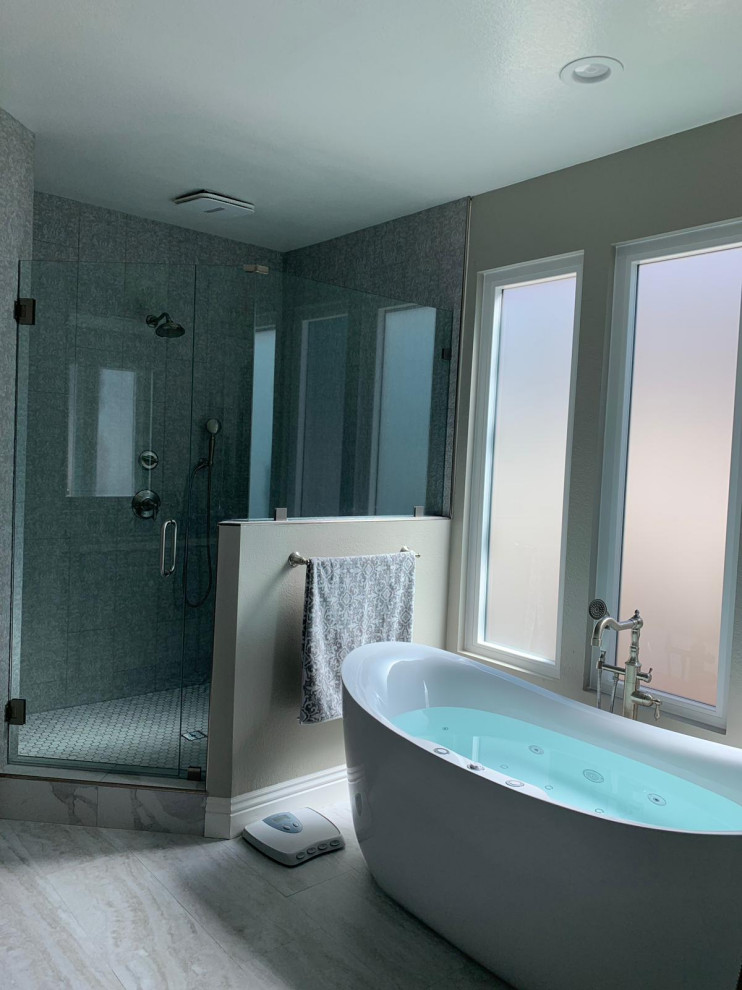 Design ideas for a large transitional master bathroom in Orange County with recessed-panel cabinets, grey cabinets, a freestanding tub, a corner shower, a one-piece toilet, gray tile, slate, green walls, marble floors, an undermount sink, marble benchtops, grey floor, a hinged shower door, yellow benchtops, a niche, a shower seat, a double vanity and a built-in vanity.
