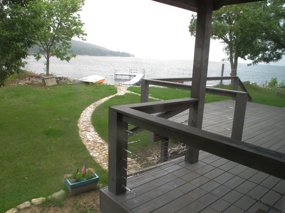 Design ideas for a beach style deck in Other.