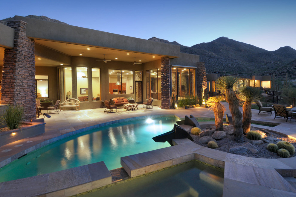 Photo of a contemporary custom-shaped pool in Phoenix.