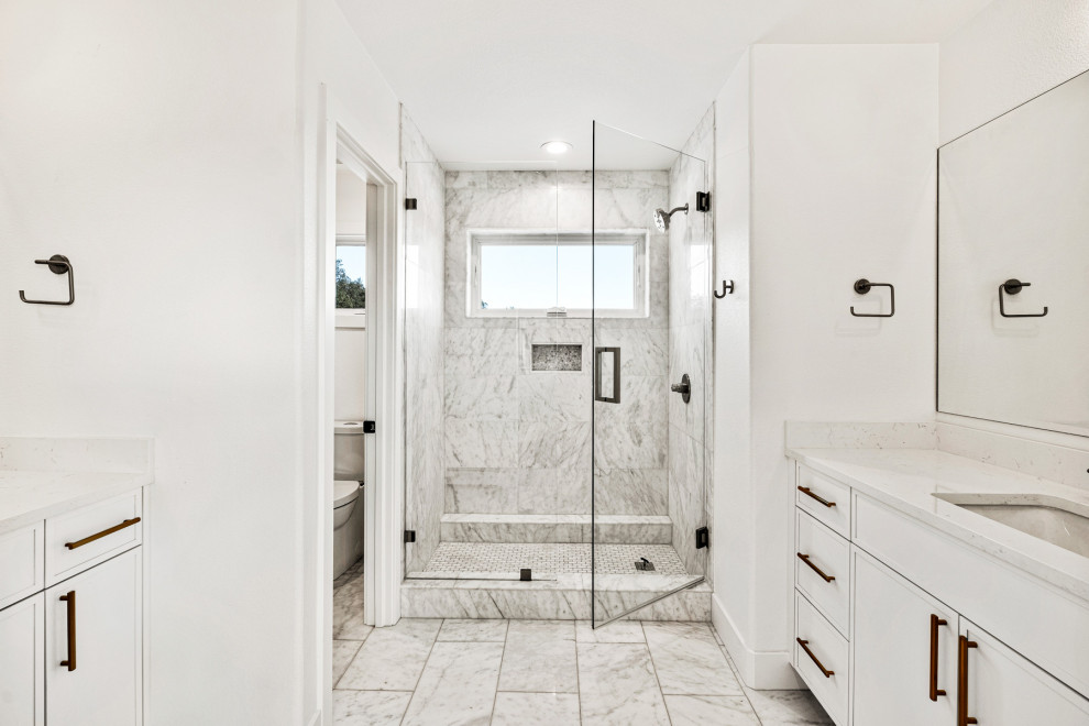 Bathroom - mid-sized contemporary beige floor and single-sink bathroom idea in Denver with flat-panel cabinets, a two-piece toilet, an undermount sink, white countertops and a built-in vanity
