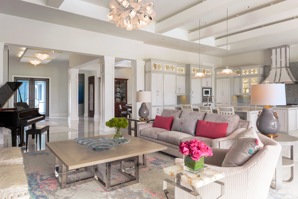 This is an example of a transitional formal open concept living room in Miami with white walls.