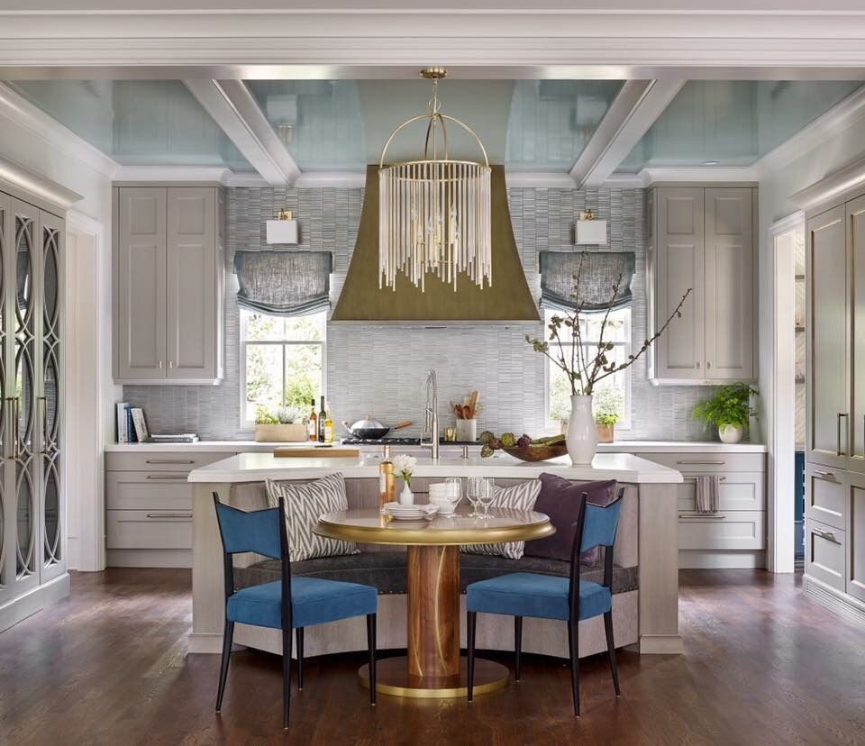 Inspiration for a mid-sized traditional single-wall eat-in kitchen in Atlanta with recessed-panel cabinets, grey cabinets, quartz benchtops, grey splashback, dark hardwood floors, with island, brown floor and white benchtop.