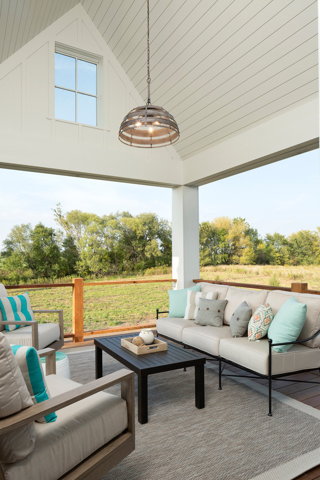 Design ideas for a transitional verandah in Minneapolis with decking and a pergola.