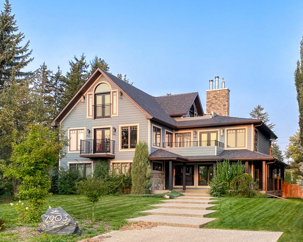 Inspiration for a transitional exterior home remodel in Edmonton