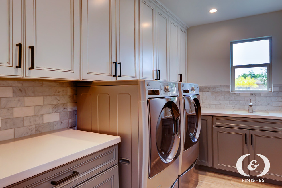 Inspiration for a transitional laundry room remodel in Phoenix