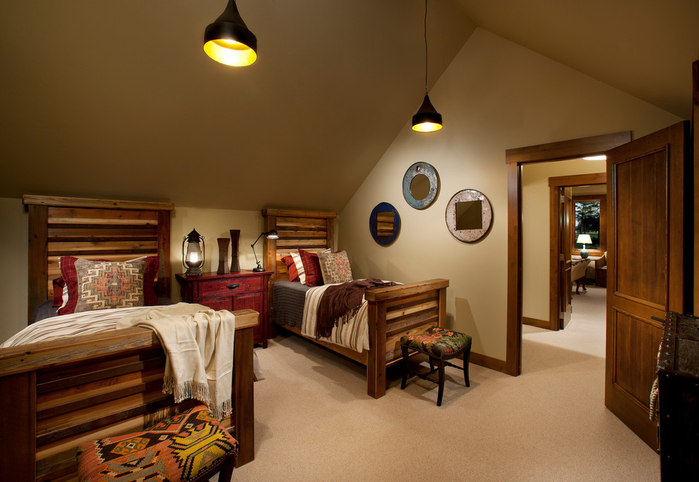 This is an example of a contemporary guest bedroom in Other with beige walls and carpet.