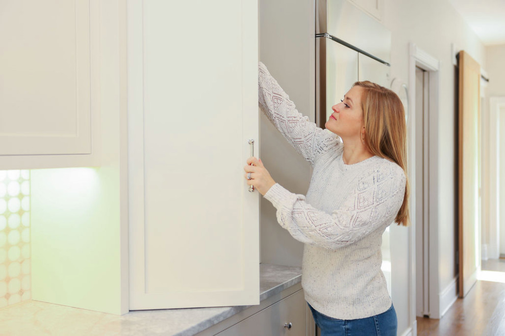 Organizer Amy Wopperer of Simplify Buffalo preparing a home for a renovation