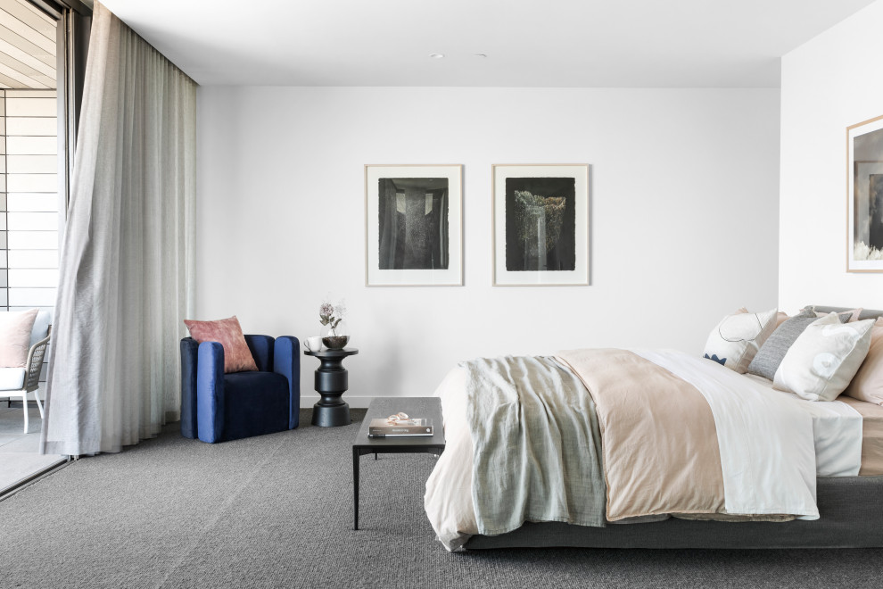 This is an example of a contemporary bedroom in Melbourne.