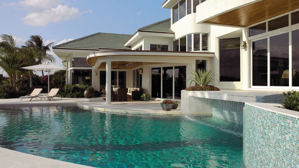 Photo of a contemporary pool in Miami.