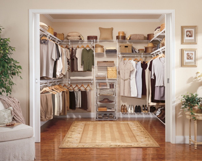 This is an example of a contemporary storage and wardrobe in Manchester.