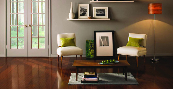 Example of a small classic open concept dark wood floor and brown floor living room design in Edmonton with beige walls, no fireplace and no tv