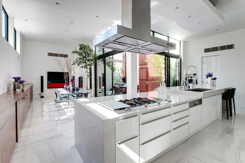 Inspiration for a large contemporary single-wall open plan kitchen in Tokyo with an undermount sink, flat-panel cabinets, white cabinets, terrazzo benchtops, stainless steel appliances, marble floors, with island and grey floor.