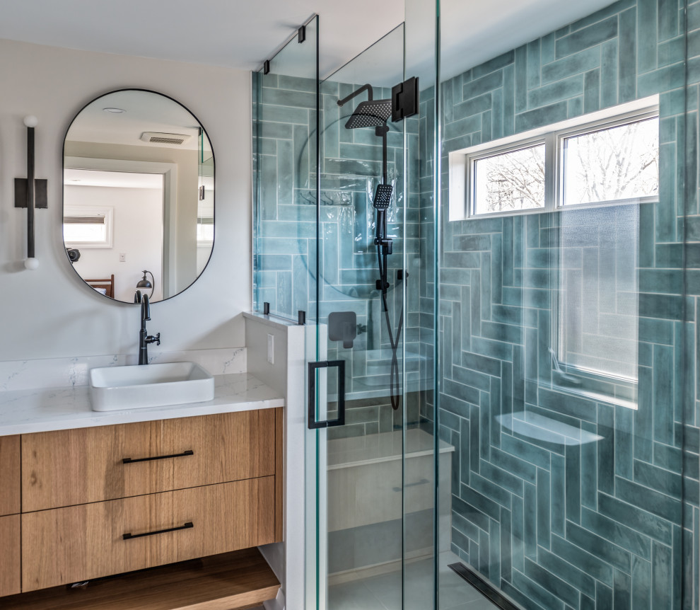 Example of a mid-sized minimalist master blue tile and ceramic tile ceramic tile, white floor and double-sink bathroom design in Ottawa with a floating vanity, flat-panel cabinets, medium tone wood cabinets, white walls, a vessel sink, quartz countertops, a hinged shower door and white countertops