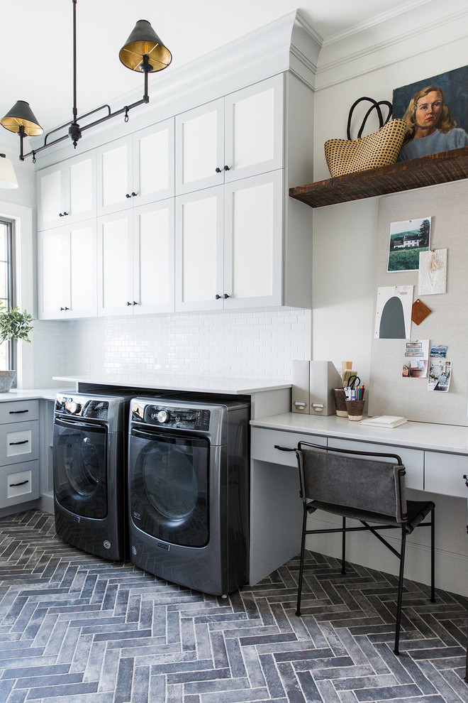 Design ideas for a mid-sized country u-shaped dedicated laundry room in Salt Lake City with white walls, a side-by-side washer and dryer, white benchtop, shaker cabinets, grey cabinets and grey floor.