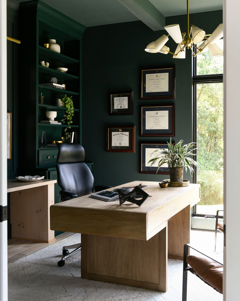 Study room - mid-sized transitional freestanding desk light wood floor study room idea with green walls