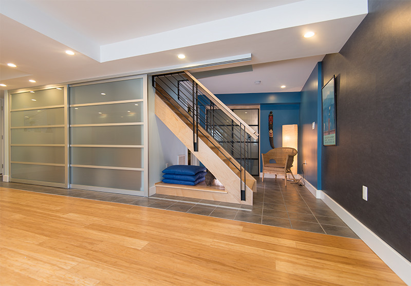 Design ideas for a contemporary home gym in DC Metro.