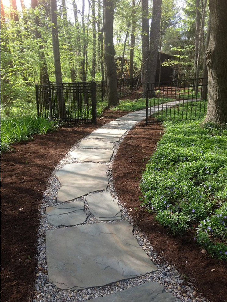 Design ideas for a large shade backyard stone garden path.