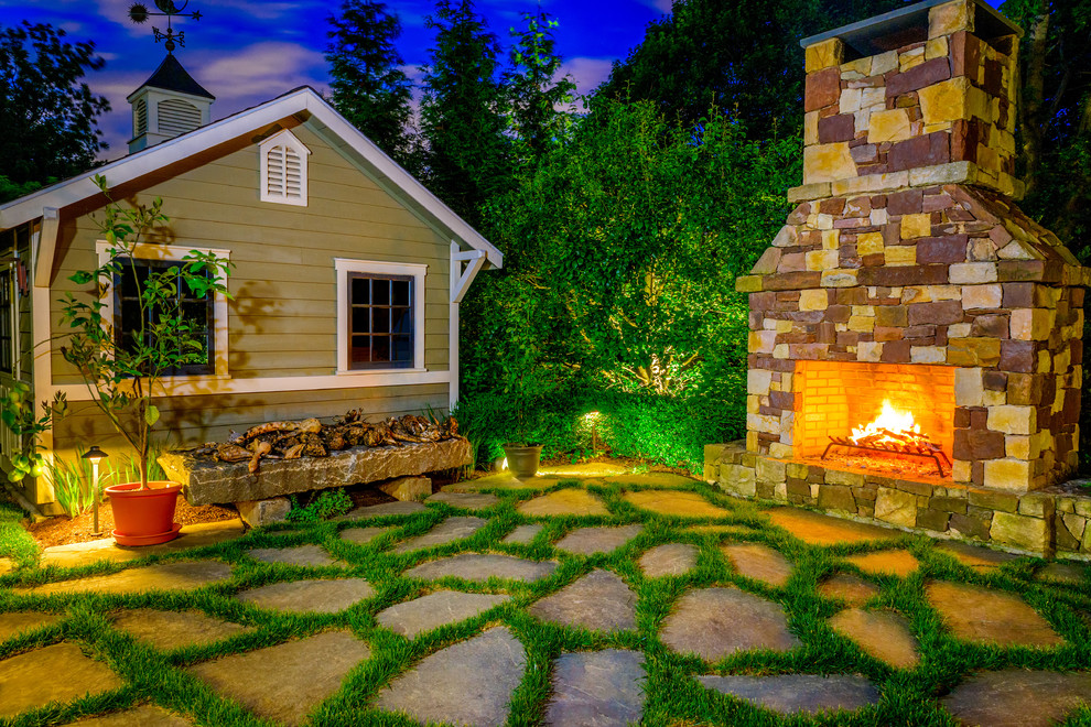 Inspiration for an expansive modern backyard patio in Wilmington with a fire feature and no cover.