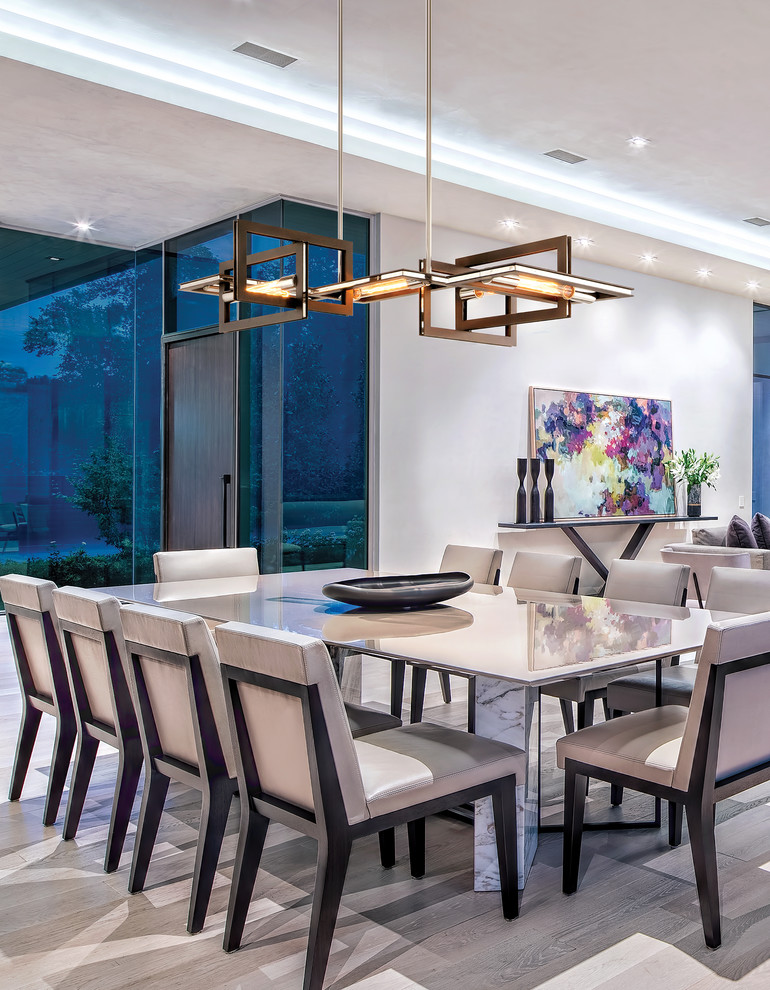 Inspiration for a contemporary gray floor great room remodel in Los Angeles with white walls