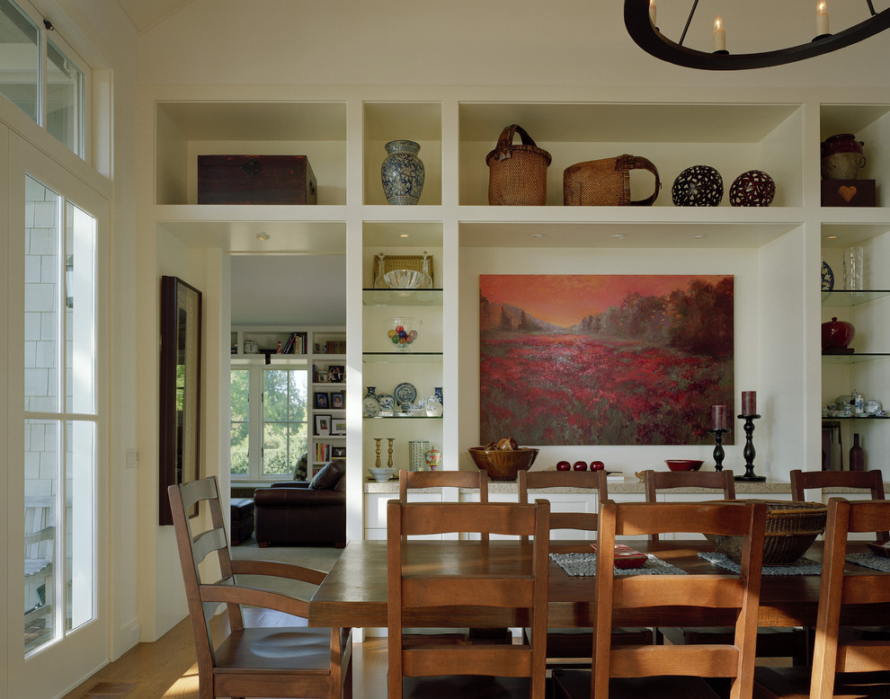 Design ideas for a traditional dining room in Seattle with medium hardwood floors.