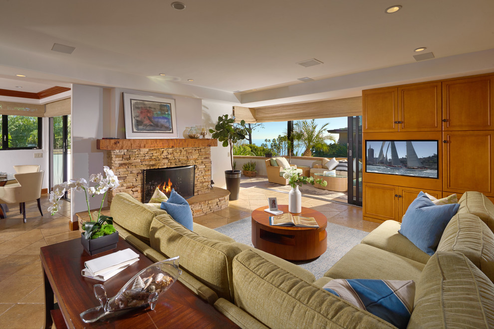 Example of an island style home design design in Orange County