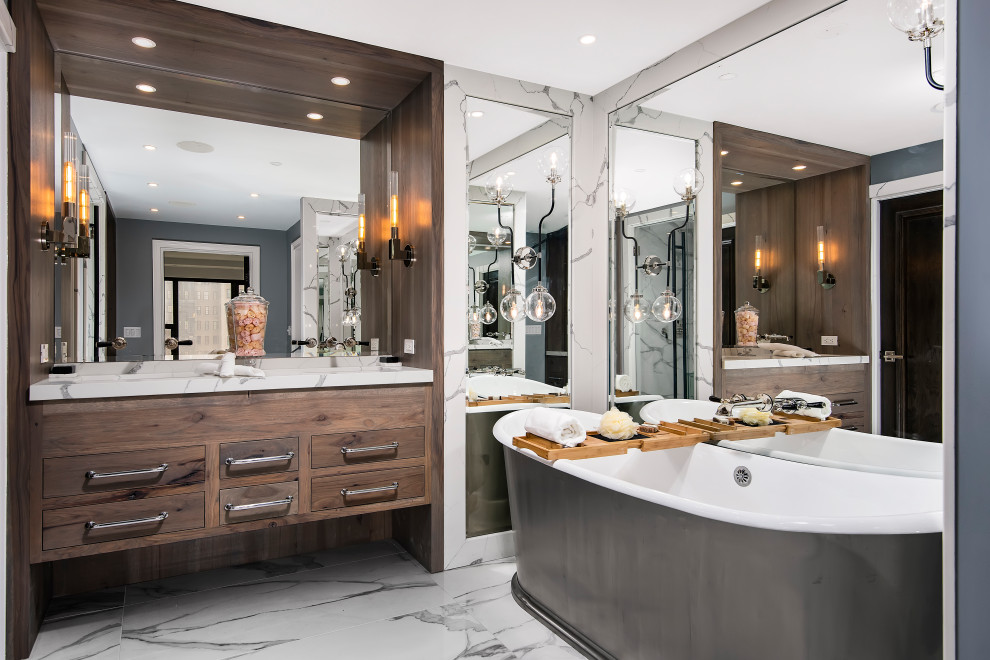 Inspiration for a large traditional master bathroom in Chicago with medium wood cabinets, a double vanity, beaded inset cabinets, a freestanding tub, an open shower, a bidet, white tile, porcelain tile, grey walls, porcelain floors, an undermount sink, engineered quartz benchtops, white floor, a hinged shower door, white benchtops, a shower seat, a floating vanity, coffered and decorative wall panelling.