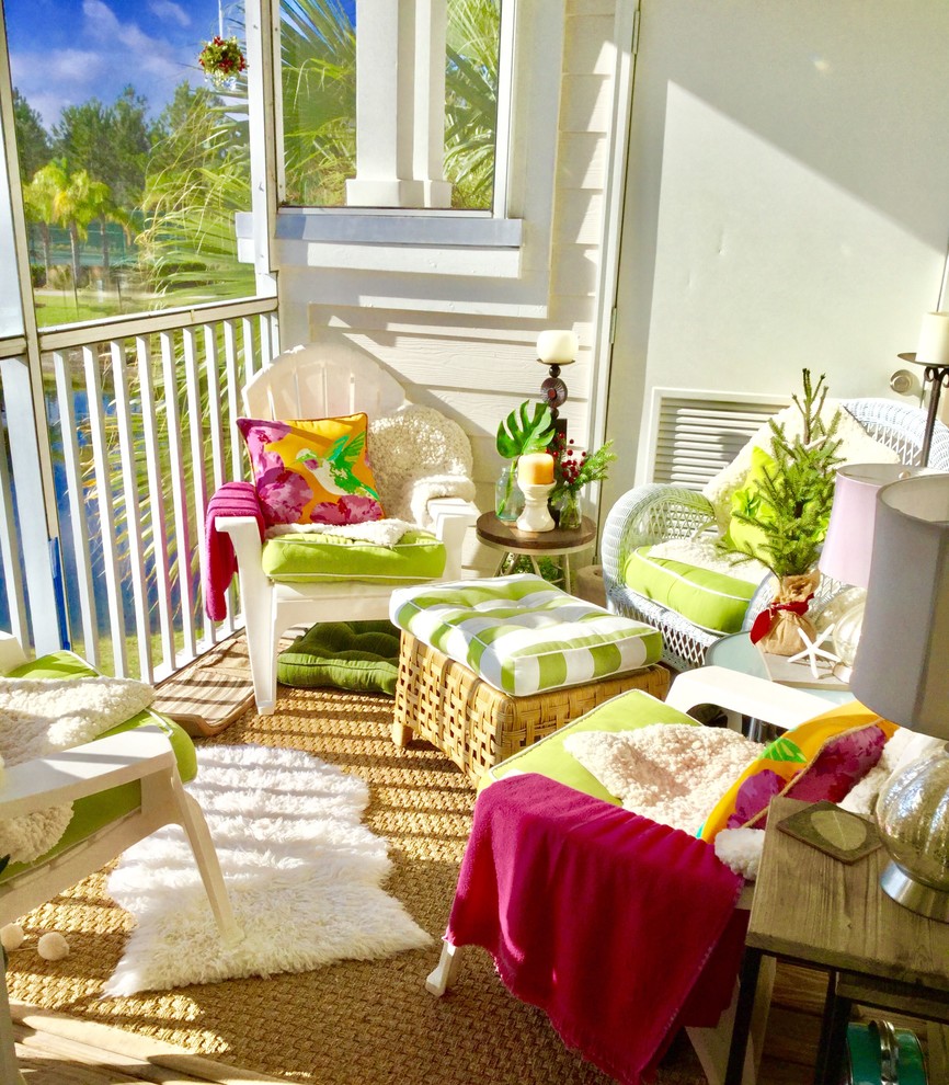 Inspiration for a beach style verandah in Orlando with decking.