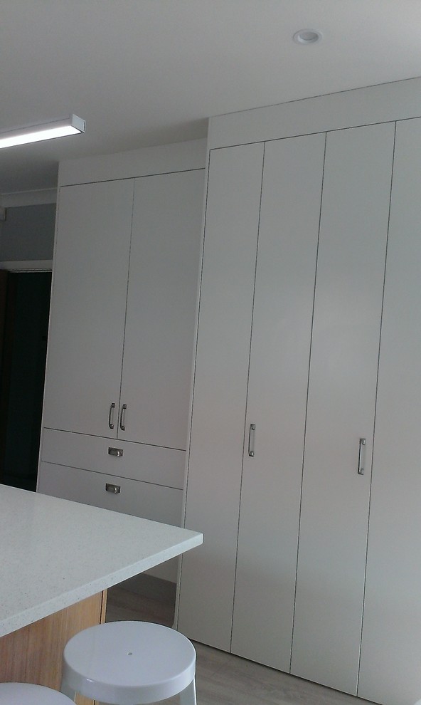white and oak kitchen and dining room
