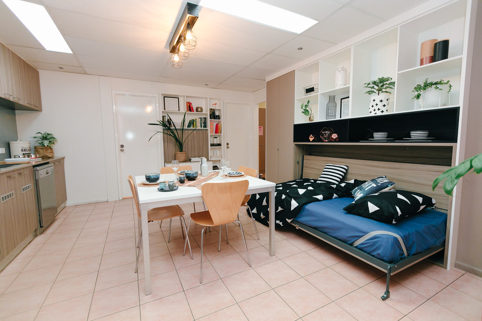 Photo of a small modern single-wall eat-in kitchen in Brisbane with medium wood cabinets, quartz benchtops, metallic splashback, glass sheet splashback, ceramic floors and no island.