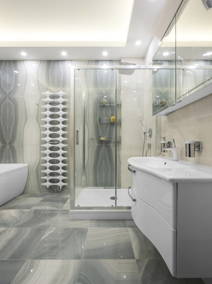 Design ideas for a contemporary master bathroom in Saint Petersburg with white cabinets, a corner shower, gray tile, grey walls, an integrated sink, flat-panel cabinets and a freestanding tub.