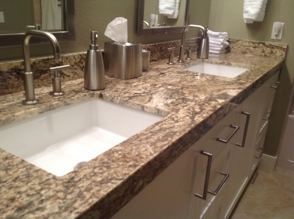 Large transitional master beige floor bathroom photo with shaker cabinets, white cabinets, white walls and an undermount sink