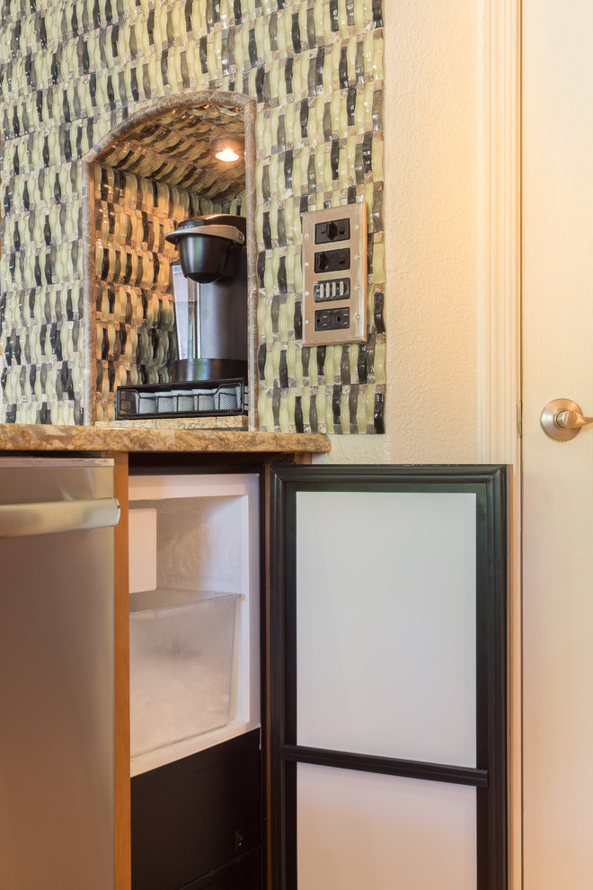 Mid-sized trendy u-shaped porcelain tile open concept kitchen photo with an undermount sink, recessed-panel cabinets, light wood cabinets, granite countertops, multicolored backsplash, glass tile backsplash, stainless steel appliances and an island