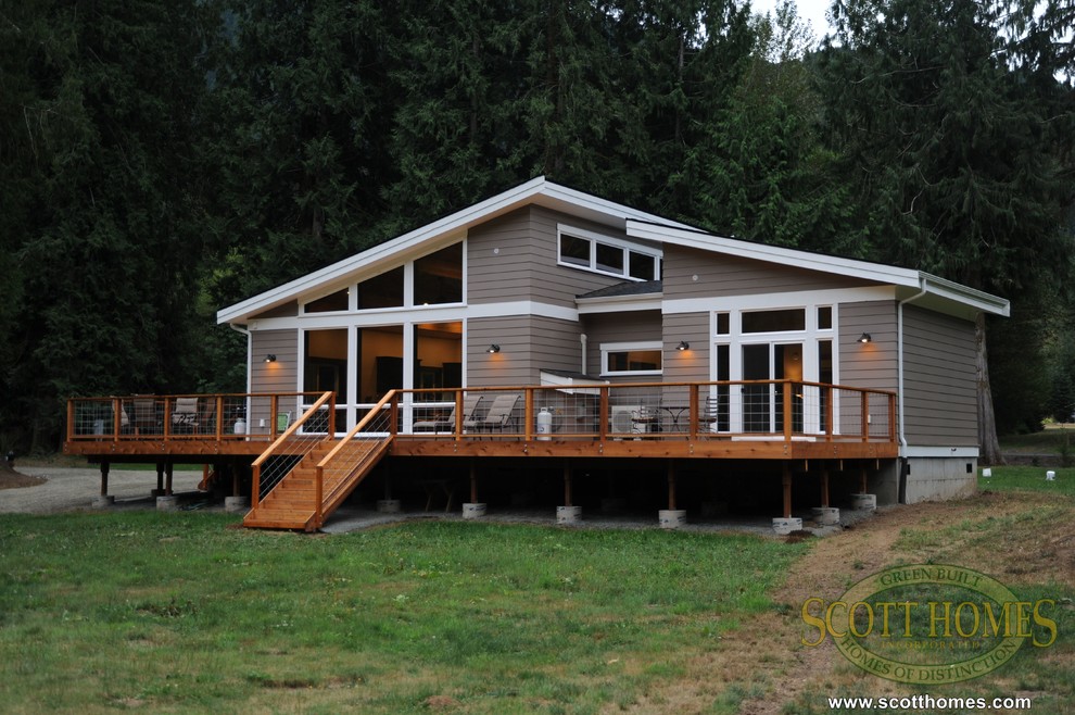 Design ideas for a small contemporary one-storey exterior in Seattle with concrete fiberboard siding.
