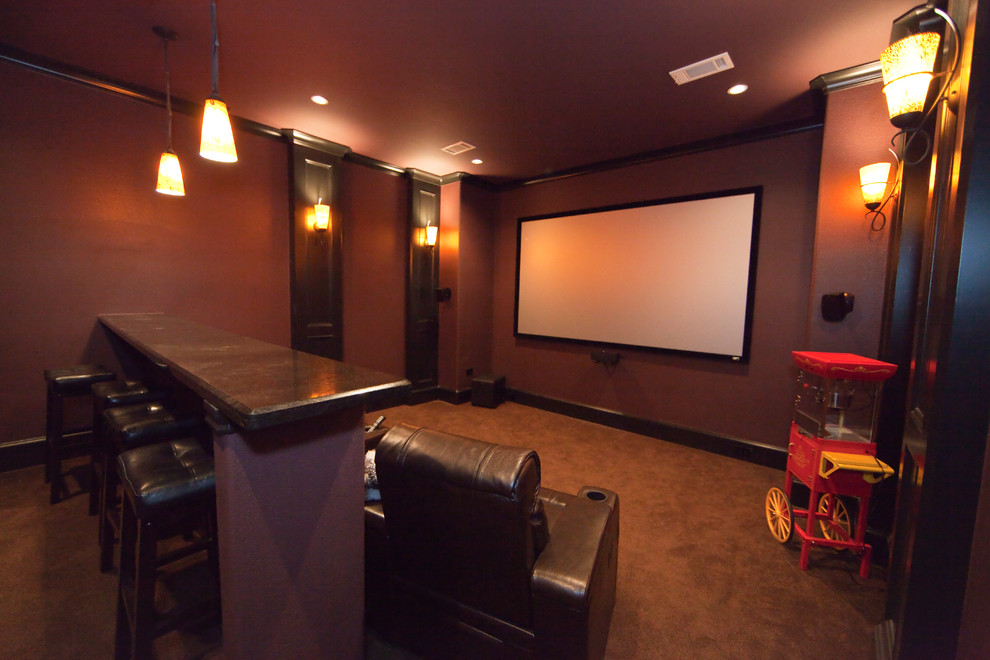 Photo of a traditional home theatre in Houston.