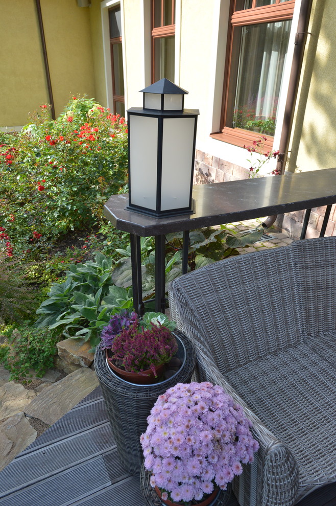 Оформление терассы перед бассейном в Колтушах.