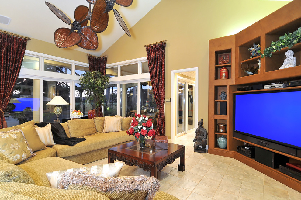 This is an example of a tropical home theatre in Tampa.
