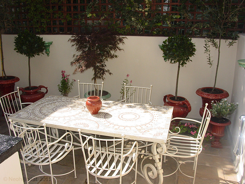 Modelo de patio in patio With cocina exterior and adoquines de piedra natural