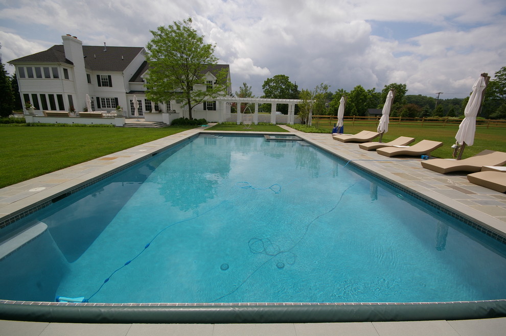 Design ideas for a contemporary pool in Philadelphia.